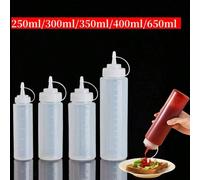 1 pièce Bouteille de pressage en plastique avec embout pointu - Avec bouchon anti-fuite et lignes de mesure, convient pour le ketchup, l'huile de sésame, la vinaigrette, etc., Bouteille de pressage en