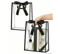 12 pièces Sacs cadeaux transparents avec bordure noire et nœud en satin ; Sacs fourre-tout transparents réutilisables en PVC, convenant pour l'emballage de cadeaux de mariage, baby shower, anniversair