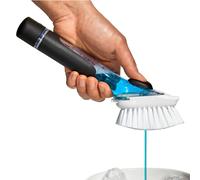 Brosse vaisselle à distributeur de savon dans le manche OXO