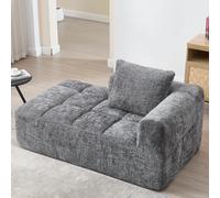 Canapé avec méridienne en chenille grise avec poches latérales et coussin