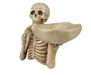 CFGTEKMB Bol à Bonbons Squelette avec Support de crâne Figurine résine Durable Parfait pour Les friandises d'halloween Centre de Table Effrayant pour Snacks Taille 22 x 21 cm