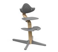 Chaise Stokke Nomi, Chêne/Gris - Le siège qui encourage l’assise active - Réglage facile sans outils - Comprend un repose-pieds stable et des roues anti-basculement - Supporte jusqu’à 150 kg