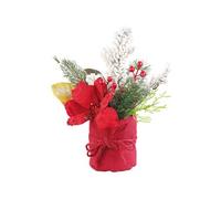 Composition florale de Noël avec fleurs, branches, baies et neige artificielle