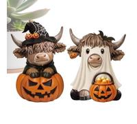 Cow Figurine Set: Bring seasonal warmth with this set of two Halloween co