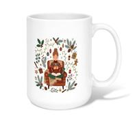 Cozy Winter Reading Citation Woman Christmas Tasse à café en céramique 445 | Fauteuil confortable, tasse à café, éléments botaniques hivernaux, style de vie amusant, atmosphère saisonnière chaleureuse