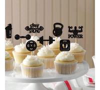 Décoration de petits gâteaux avec paillettes noires pour entraînement de gym, incluant des formes de biceps, haltères, kettlebells et abdominaux, parfait pour un anniversaire sur le thème du fitness o
