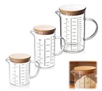 Ensemble de verres doseurs en verre, 3 pièces, contenances : 350 ml, 500 ml et 1000 ml. Résistant à la chaleur, en verre borosilicaté, avec bec verseur et couvercles en bambou