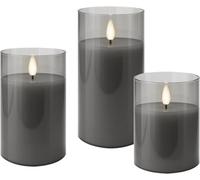 goobay LED bougies en cire véritable en verre, set de 3 gris transparent, avec mèche pendule, fonction minuterie, à piles, blanc chaud (2700 K), bougies piliers, avec 10 piles AAA, 75261