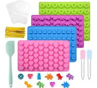 Grand lot de moules à bonbons en silicone avec des bonbons gélifiés et des dinosaures