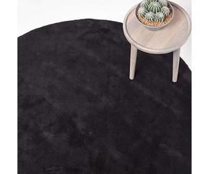 HOMESCAPES Tapis décoratif Rond Couleur Noir 150 cm de diamètre en 100% Coton
