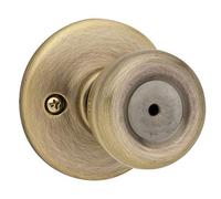 Kwikset Tylo Bouton de porte intérieure avec serrure, poignée de porte pour salle de bain et chambre à coucher, poignée de porte en laiton antique, sans vec protection Microban, 1 pièce (1