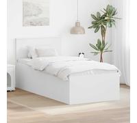 Le sommier à lattes moderne blanc 75x190 cm en bois est équipé d'une tête de lit et de lattes rigides, offre un maintien stable du matelas et une construction durable jusqu'à