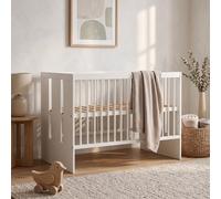 Lit bébé à barreaux Paula, 120x60 cm, blanc. Lit pour enfant en bois, avec barreaux réglables en hauteur, idéal pour équiper une chambre de bébé de style scandinave