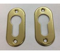 Lot de 2 clous ovales pour cylindre à profil européen. Couleur laiton brillant verni pour cylindre européen trou Yale. AGB C00640. Dimensions : 60 x 28 mm.