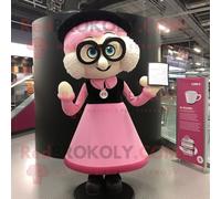 Mascotte Redbrokoly De Personnage Guinness Rose Habillé D'un Chemisier Et De Lunettes De Lecture Multicolore