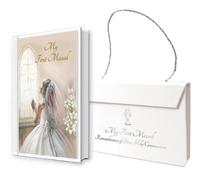 Missel et marque-page rigide avec carte de prière et inscription « My First Holy Communion » dans un sac de transport blanc pour une fille