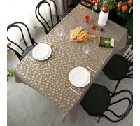 Nappe de fête de Noël au design imperméable et respirante – recouverte d'un tissu en coton doux et de grande qualité, orné d'un motif de flocons de neige et d'une teinte rouge bronze chaleureuse.