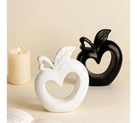 Sculpture en résine en forme de pomme noire et blanche - Design cœur creux avec finition mate, convient pour être placée sur les étagères du salon, les bureaux et les coiffeuses de la chambre à couche