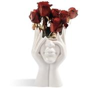 Un vase en céramique au design féminin, parfait pour décorer un bureau ou pour être posé sur une étagère.