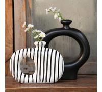 Vase noir et blanc rayé de forme ronde et donut, style scandinave minimaliste moderne. Vase décoratif convenant pour l'affichage de roseaux et de fleurs séchées. Peut être utilisé comme décoration de 